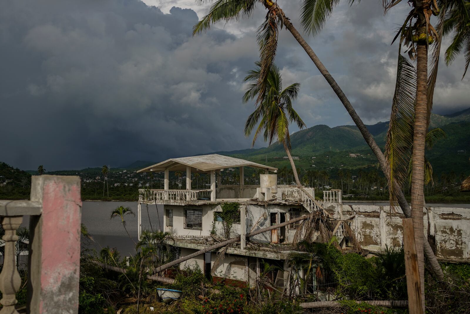 A house lies damaged after the impact of Hurricane John, in Pie de la Cuesta, Guerrero state, Mexico, Monday, Sept. 30, 2024. (AP Photo/Felix Marquez)