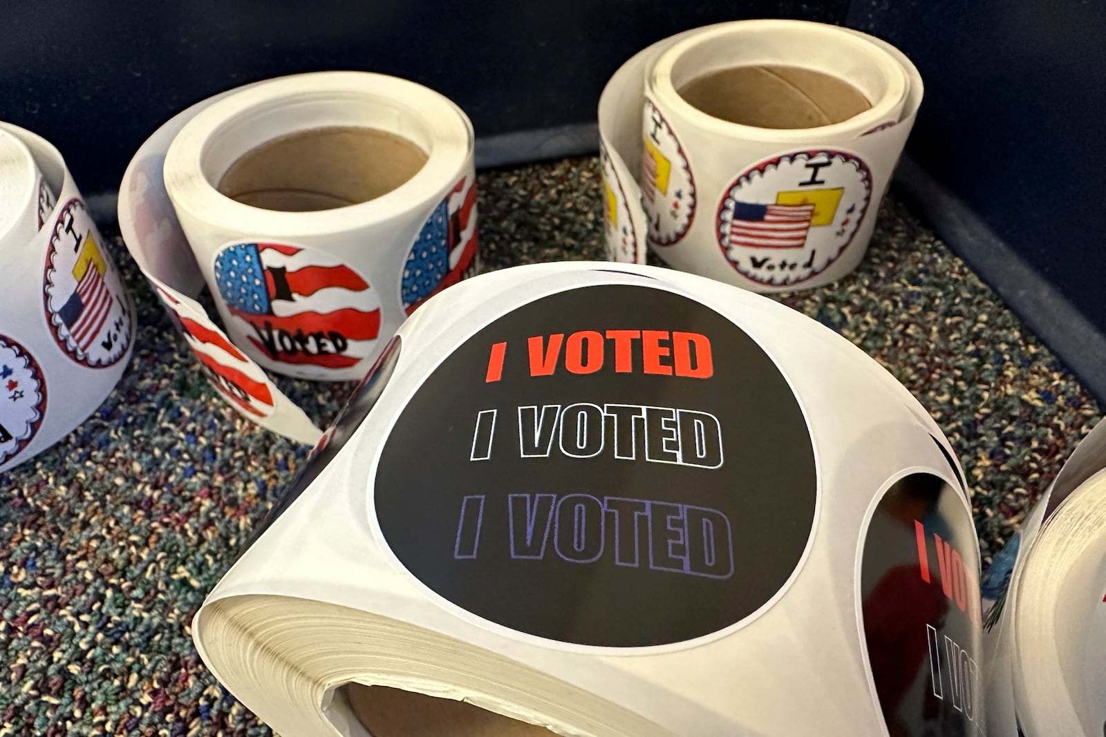 Rolls of I Voted stickers are stocked at an early voting center in Albuquerque, N.M., on Wednesday, Oct. 30, 2024. (AP Photo/Susan Montoya Bryan)