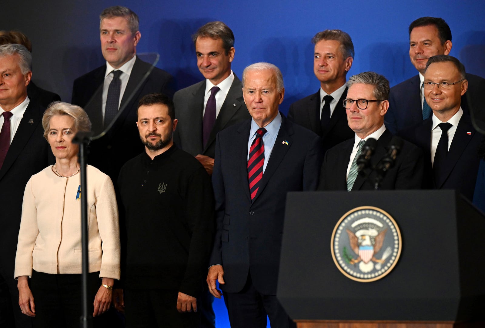 U.S. President Joe Biden, center, with Ukraine's President Volodymyr Zelenskyy, front second left, President of the European Commission Ursula von der Leyen, front left, Britain's Prime Minister Keir Starmer, front second right, President of Poland Andrzej Duda, right, and other world leaders pose for a family picture of the launching of a Joint Declaration of Support for Ukrainian Recovery and Reconstruction, Wednesday, Sept. 25, 2024, in New York. (Leon Neal/Pool Photo via AP)