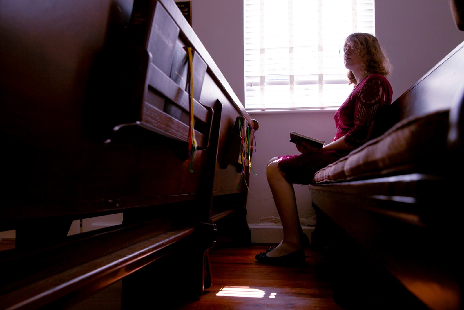 In this photo provided by the ACLU of Virginia, Ellenor Zinski attends church at Trinity Episcopal Church in Lynchburg, Va., on Oct. 6, 2024. (Phuong Tran/ACLU of Virginia via AP)