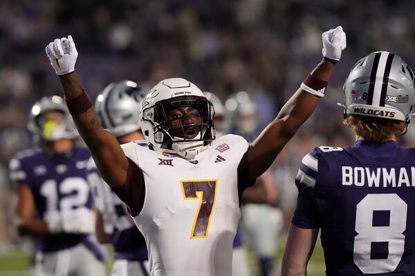 Arizona State defensive back Shamari Simmons (7) celebrates after intercepting a pass in the end zone during the second half of an NCAA college football game against Kansas State Saturday, Nov. 16, 2024, in Manhattan, Kan. Arizona State won 24-14. (AP Photo/Charlie Riedel)