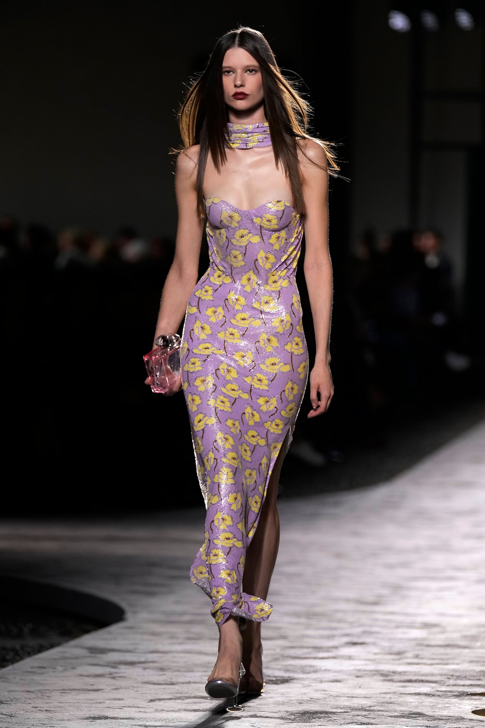 A model wears a creation as part of the Versace Spring Summer 2025 collection, that was presented in Milan, Italy, Friday, Sept. 20, 2024. (AP Photo/Antonio Calanni)