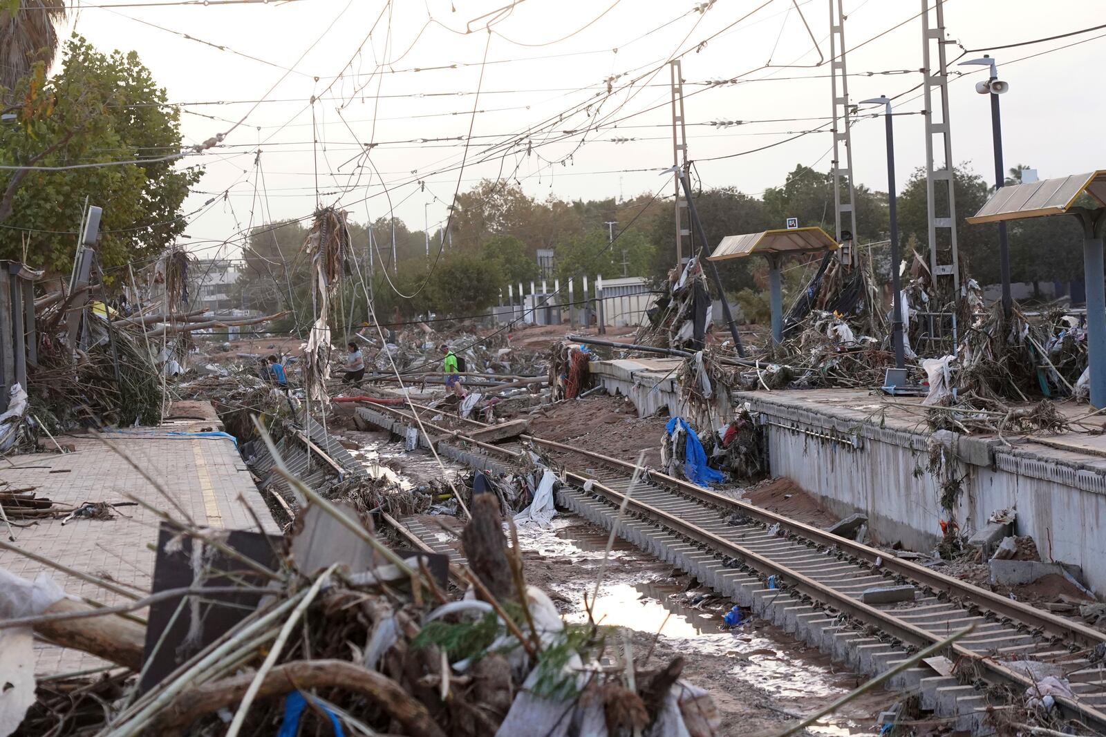 Train tracks are seen affected by floods in Paiporta, near Valencia, Spain, Wednesday, Oct. 30, 2024. (AP Photo/Alberto Saiz)