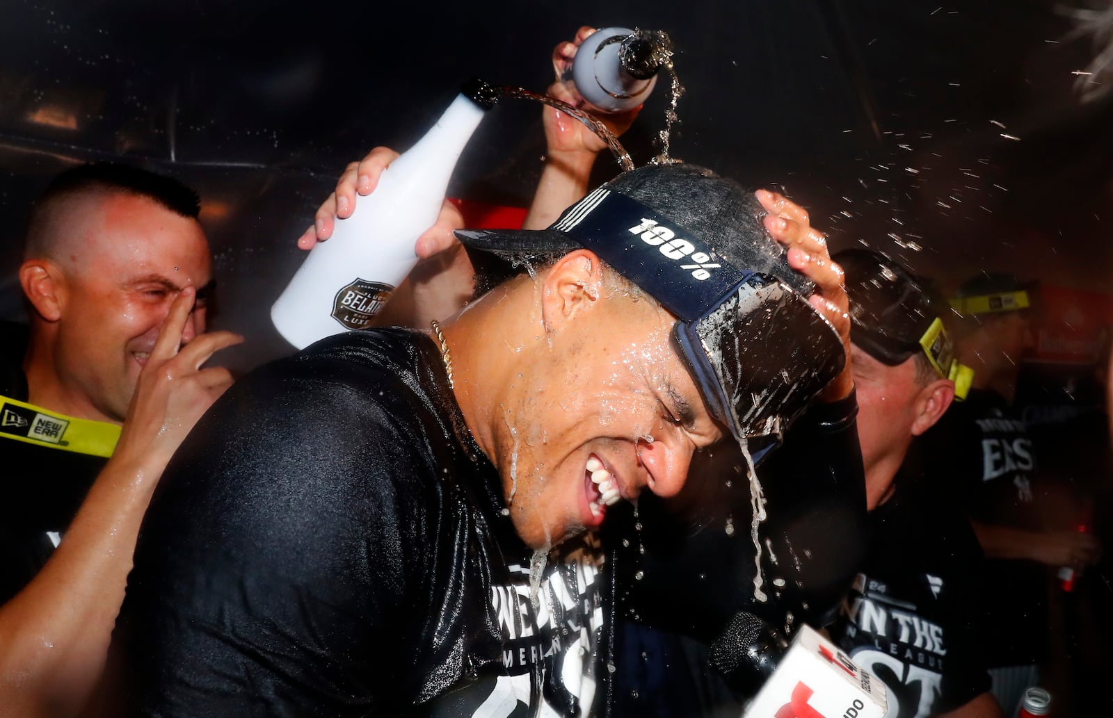 New York Yankees outfielder Juan Soto celebrates with teammates after clinching the American League East title. Thursday, Sept. 26, 2024, in New York. (AP Photo/Noah K. Murray)