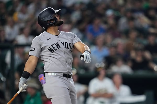New York Yankees' Jasson Domínguez watches his sacrifice fly during the fifth inning of a baseball game against the Athletics, Friday, May 9, 2025, in West Sacramento, Calif. (AP Photo/Godofredo A. Vásquez)