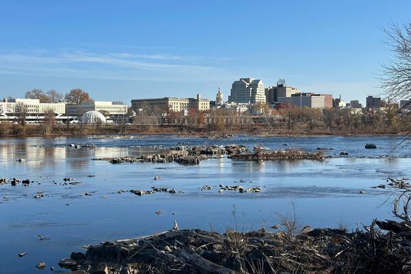 The Delaware River overlooking Trenton, N.J. flows downstream as seen from from Morrisville, Pa., on Monday, Nov. 25, 2024. (AP Photo/Mike Catalini)