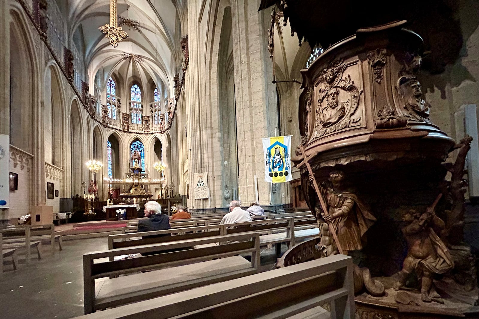 Parishioners wait for the start of a service at St. Martin's Basilica, in Halle, Belgium, Friday, Sept. 6, 2024. (AP Photo/Raf Casert)