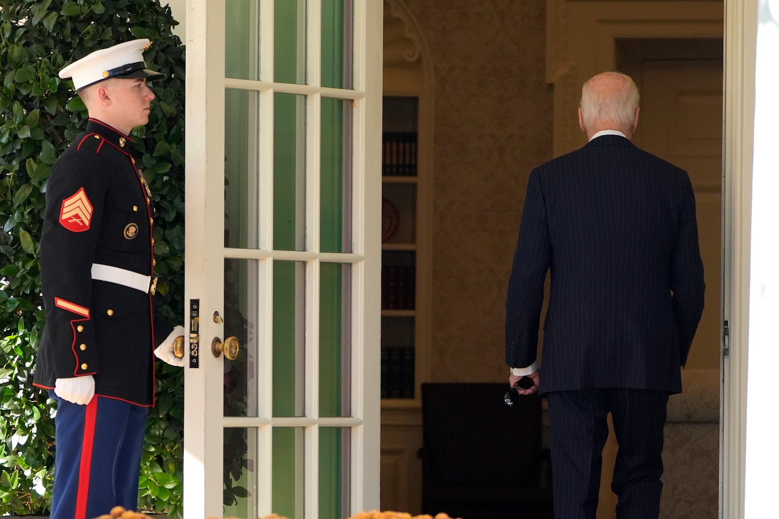 President Joe Biden departs after speaking in the Rose Garden of the White House in Washington, Thursday, Nov. 7, 2024. (AP Photo/Mark Schiefelbein)