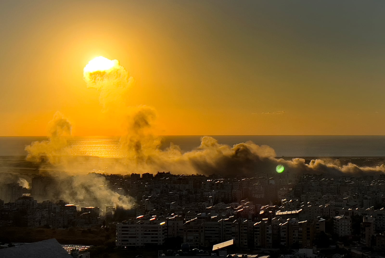 Smoke rises from Israeli airstrikes on Dahiyeh, as the sunset in the southern suburb of Beirut, Lebanon, Saturday, Oct. 19, 2024. (AP Photo/Hussein Malla)