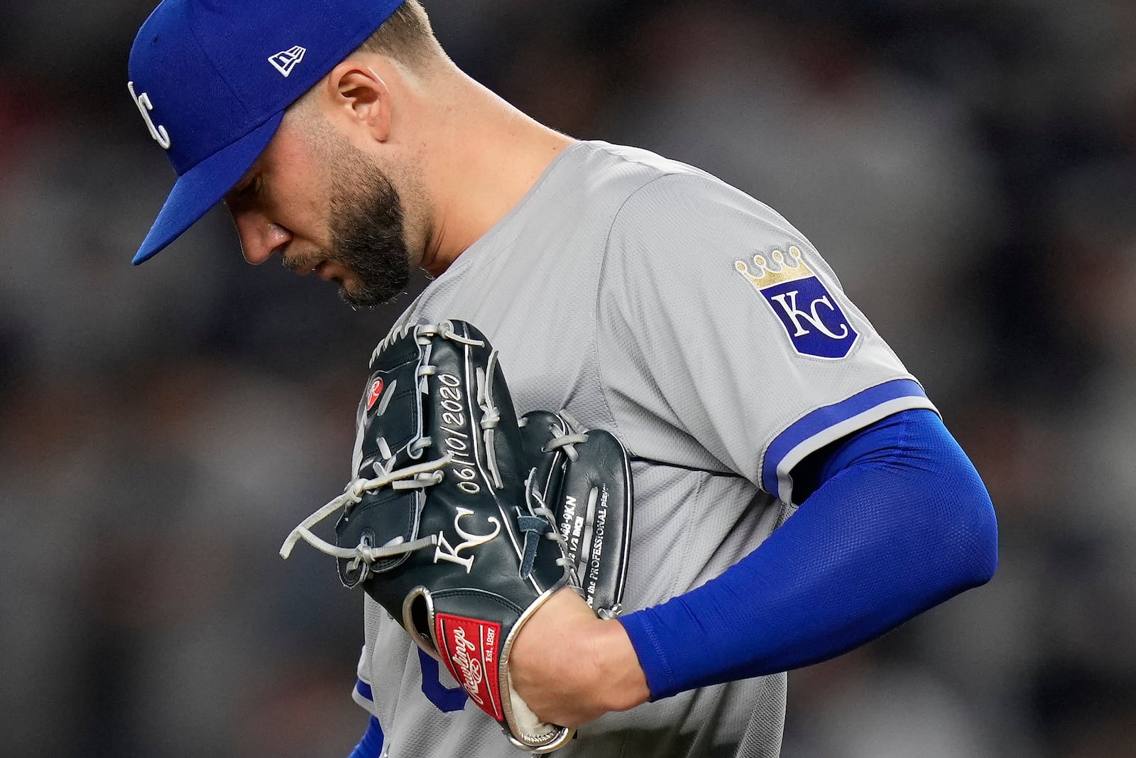 The date 06/10/2020 is displayed on Kansas City Royals pitcher Lucas Erceg's (60) glove during the ninth inning of Game 2 of the American League baseball playoff series against the New York Yankees, Monday, Oct. 7, 2024, in New York. (AP Photo/Seth Wenig)