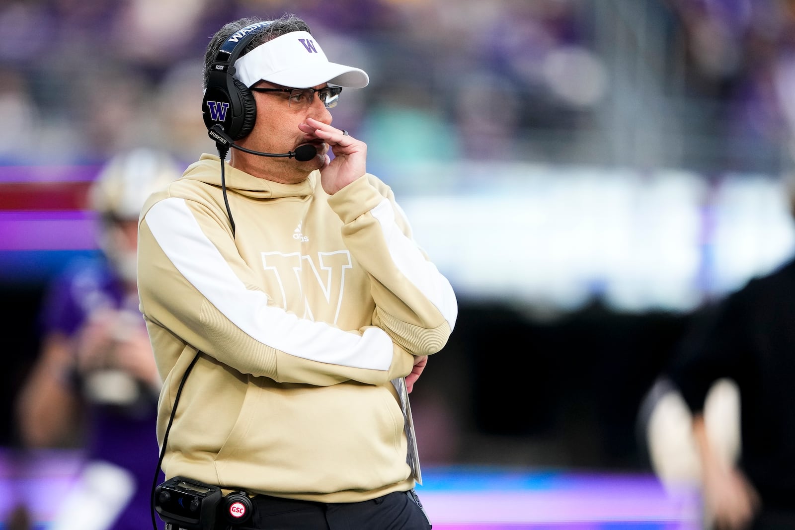 Washington head coach Jedd Fisch stands on the sideline during the first half of an NCAA college football game against Michigan, Saturday, Oct. 5, 2024, in Seattle. (AP Photo/Lindsey Wasson)