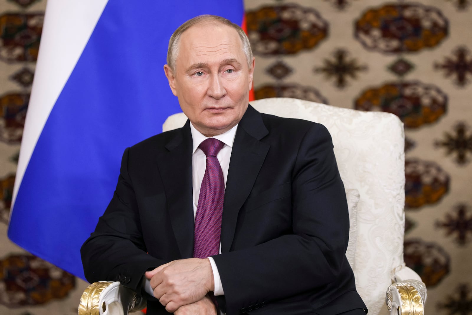 Russian President Vladimir Putin listens to Iranian President Masoud Pezeshkian during their meeting on the sidelines of the International Forum "The Interconnection of Times and Civilizations – the basis of peace and development" dedicated to the 300th anniversary of the birth of the outstanding Turkmen poet and thinker Magtymguly Fragi in Ashgabat, Turkmenistan, Friday, Oct. 11, 2024. (Alexander Shcherbak, Sputnik, Kremlin Pool Photo via AP)