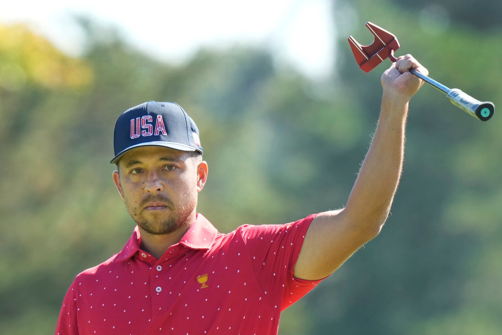 United States team member Xander Schauffele reacts after making a birdie on the first hole during their fifth round singles match at the Presidents Cup golf tournament at Royal Montreal Golf Club on Sunday, Sept. 29, 2024, in Montreal. (Frank Gunn/The Canadian Press via AP)