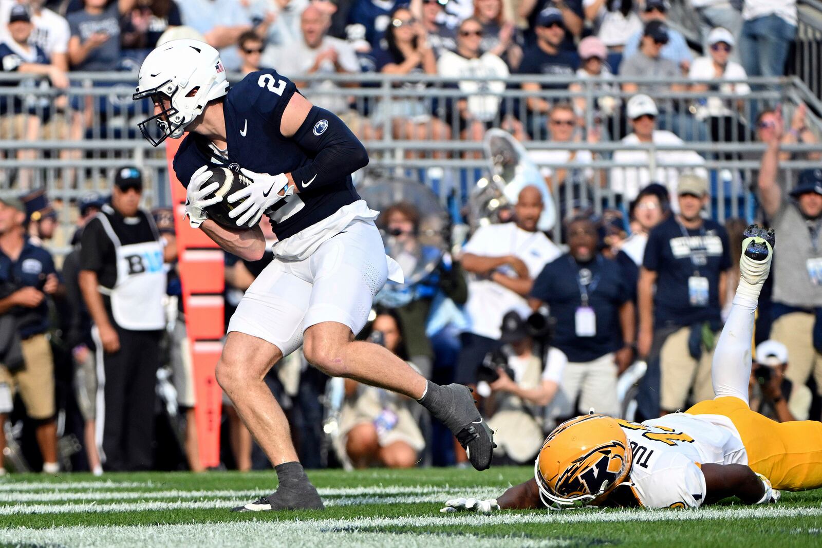 Penn State wide receiver Liam Clifford (2) catches a touchdown pass in front of Kent State safety Tevin Tucker, right, during the second quarter of an NCAA college football game, Saturday, Sept. 21, 2024, in State College, Pa. (AP Photo/Barry Reeger)