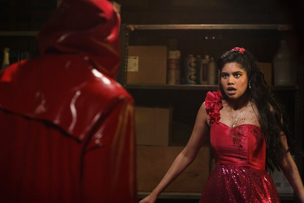This image released by Netflix shows Rebecca Ablack, right, in a scene from "Fear Street: Prom Queen." (Sabrina Lantos/Netflix via AP)