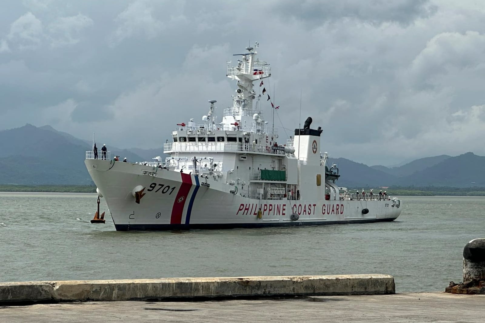 FILE - In this photo provided by the Philippine Coast Guard, the Philippine coast guard vessel BRP Teresa Magbanua prepares to dock at Puerto Princesa, Palawan province, Philippines, Sunday Sept. 15, 2024, after being deployed for five-months at Escoda shoal in the disputed South China Sea. (Philippine Coast Guard via AP, File)