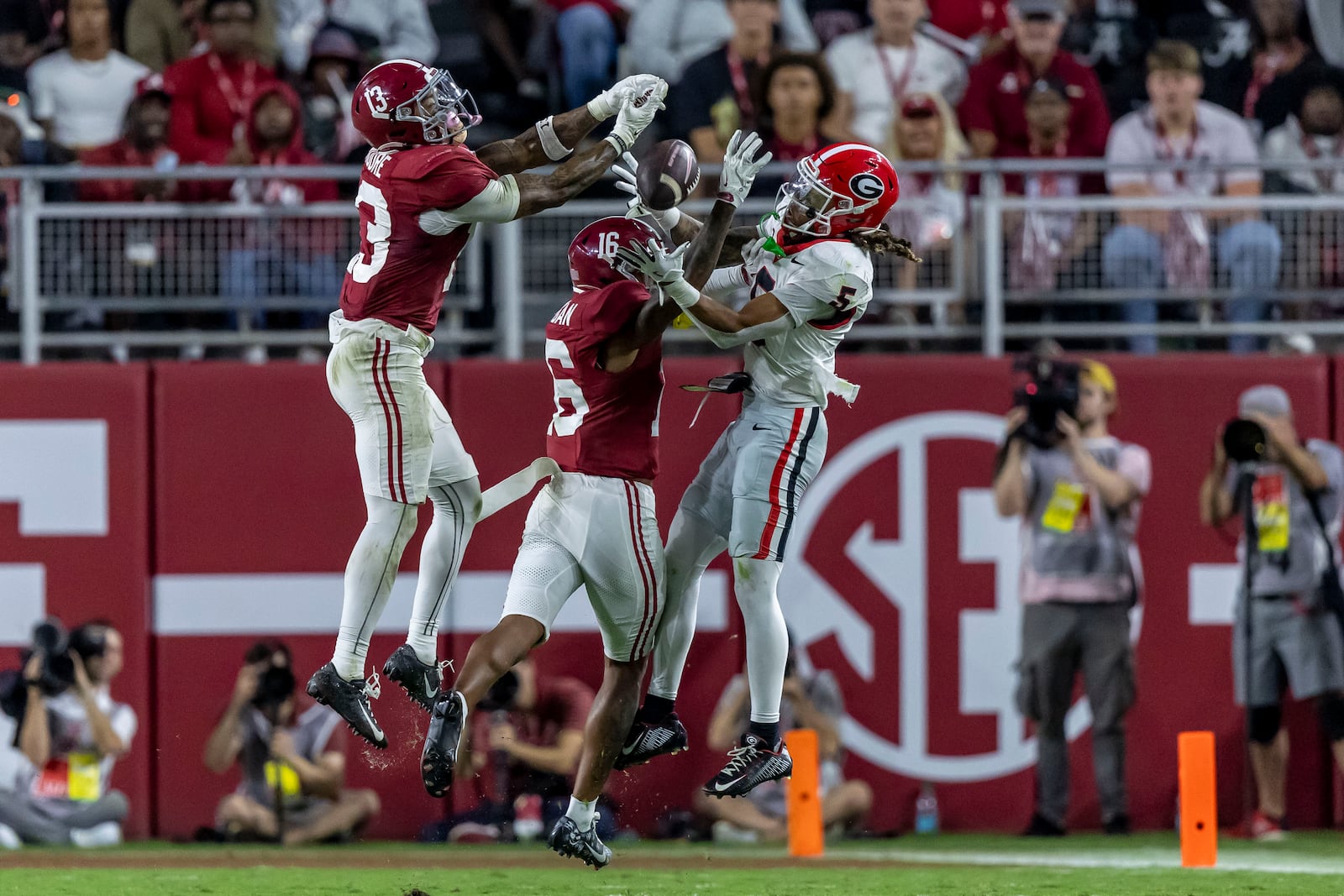 Alabama defensive back Keon Sabb (3) and Alabama defensive back Red Morgan (16) defend a pass to Georgia wide receiver Anthony Evans III (5) which fell incomplete during the second half of an NCAA college football game, Saturday, Sept. 28, 2024, in Tuscaloosa, Ala. (AP Photo/Vasha Hunt)