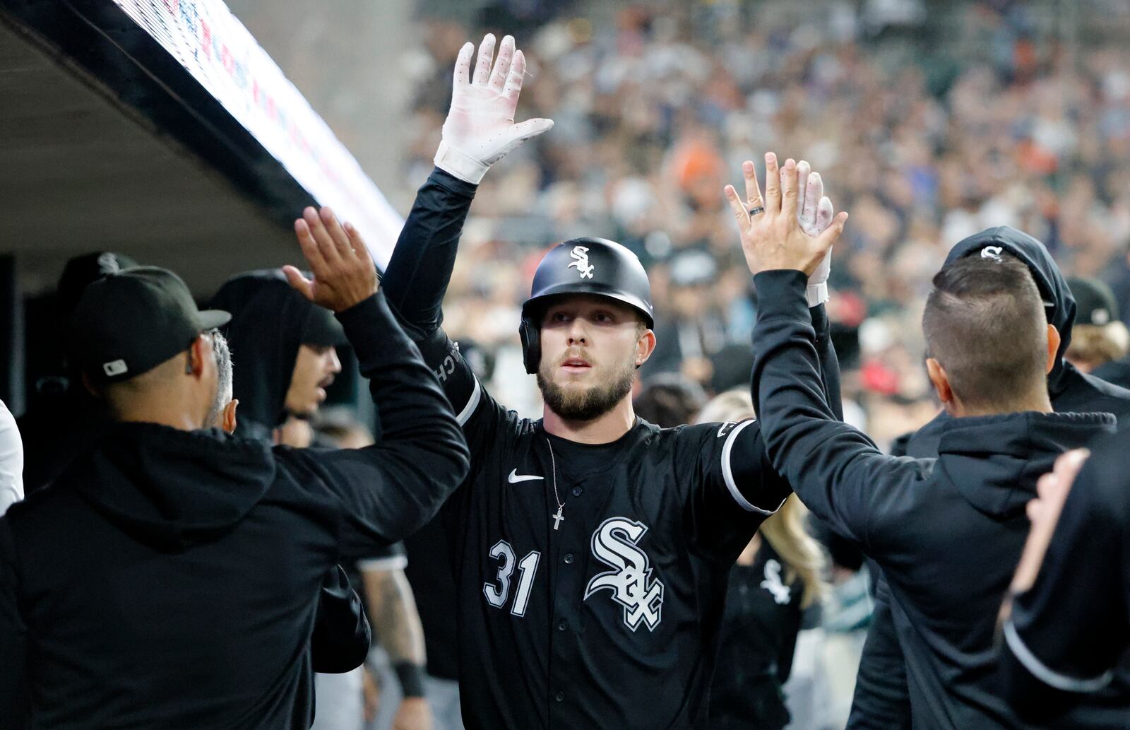 Chicago White Sox's Zach DeLoach (31) celebrates after hitting a home run against the Detroit Tigers during the sixth inning of a baseball game, Friday, Sept. 27, 2024, in Detroit. (AP Photo/Duane Burleson)