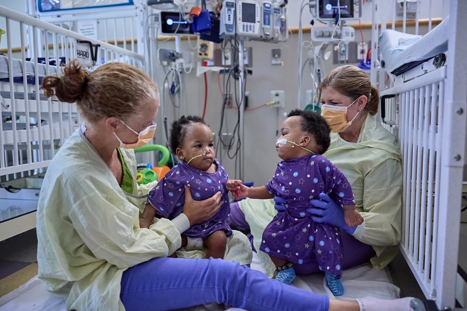 This undated photo provided by the Children’s Hospital of Philadelphia in October 2024 shows previously conjoined twins, Amari and Javar Ruffin, after separation surgery at the Children’s Hospital of Philadelphia. (Ed Cunicelli/Children’s Hospital of Philadelphia via AP)