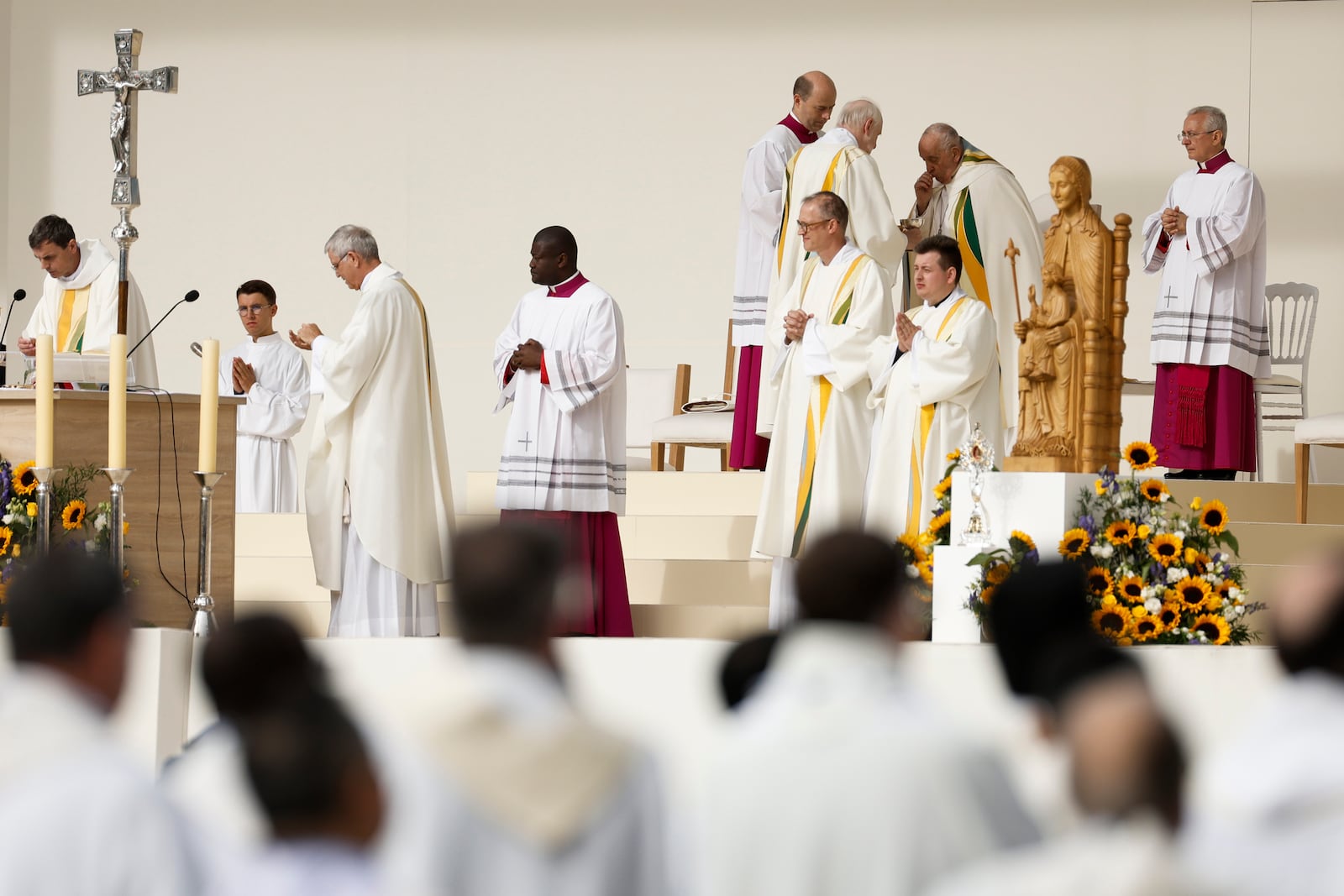 Pope Francis presides over the Sunday mass at King Baudouin Stadium, in Brussels Sunday, Sept. 29, 2024. (AP Photo/Omar Havana)