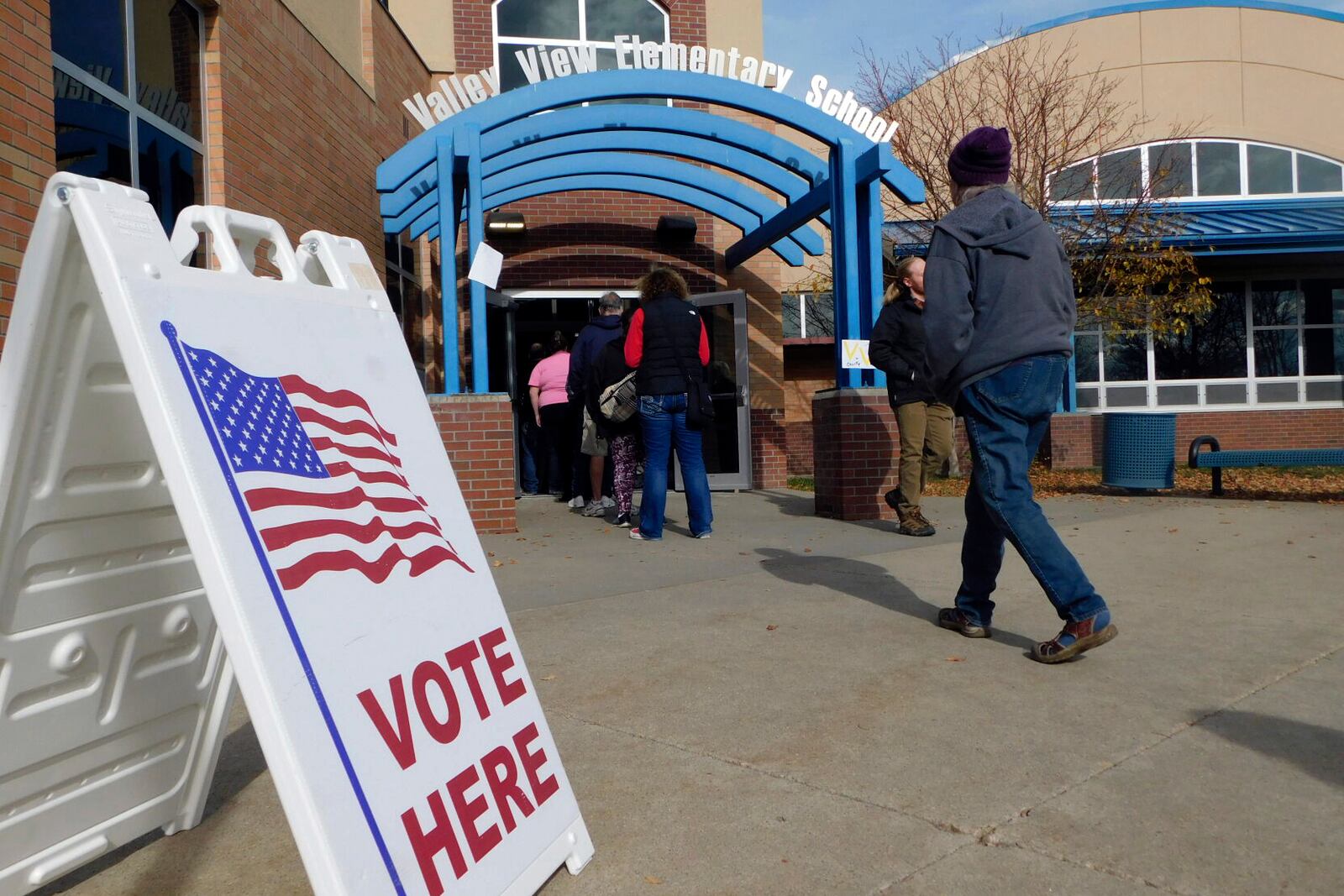 Pennigton County voters head to the polls at Valley View Elementary School Gym on Election Day, Tuesday, Nov. 5, 2024, in Rapid City, S.D. (Madison Willis/Rapid City Journal via AP)