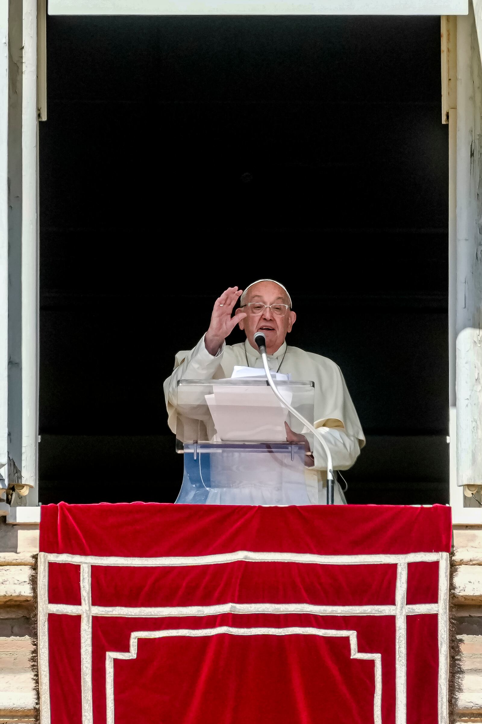 Pope Francis appears at the window of his studio for the traditional noon blessing of faithful and pilgrims gathered in St. Peter's Square at The Vatican, Thursday, Dec. 7, 2006. (AP Photo/Andrew Medichini)