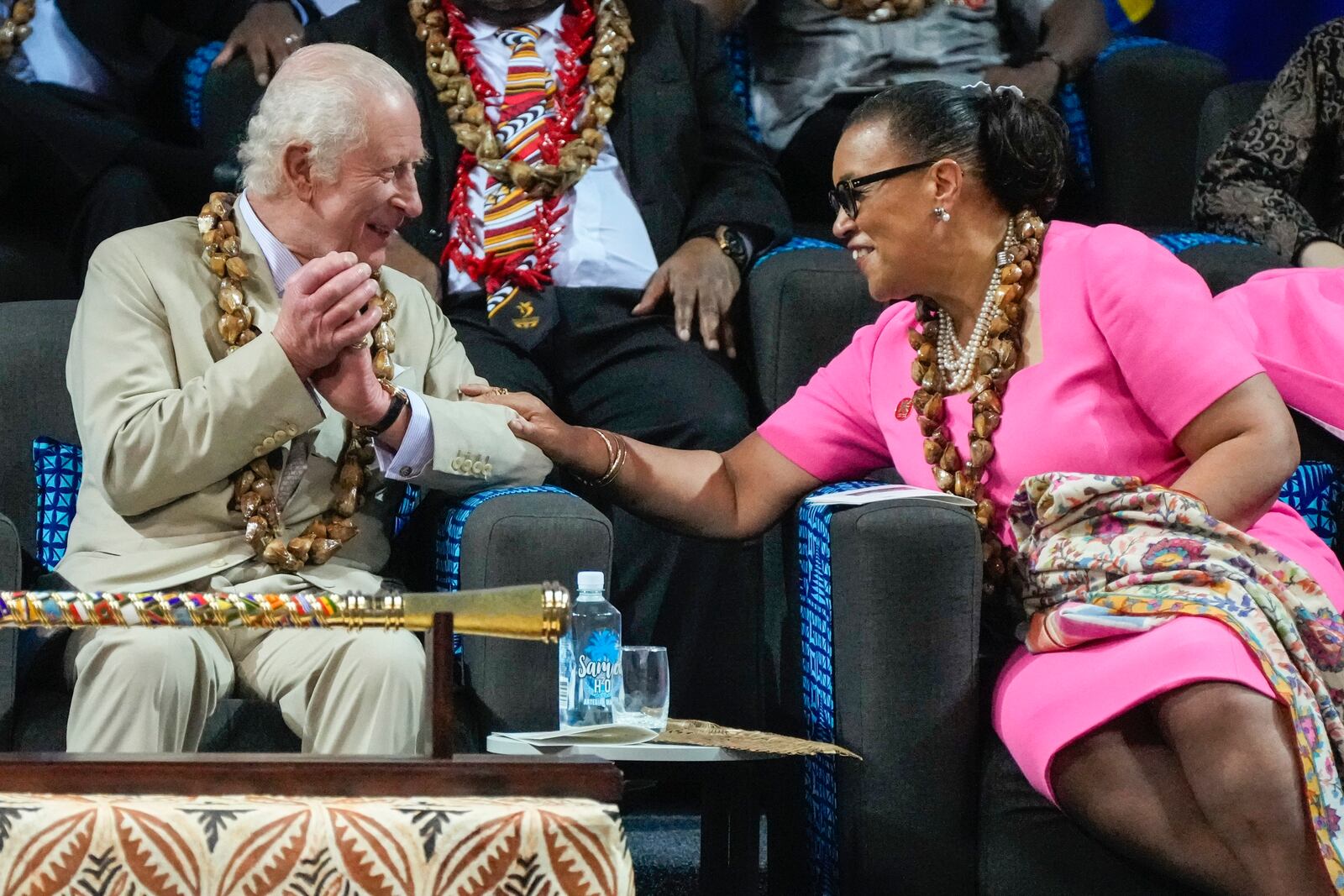 Britain's King Charles and CHOGM Secretary General Patricia Scotland talk during the opening ceremony for the Commonwealth Heads of Government meeting in Apia, Samoa, Friday, Oct. 25, 2024. (AP Photo/Rick Rycroft/Pool)