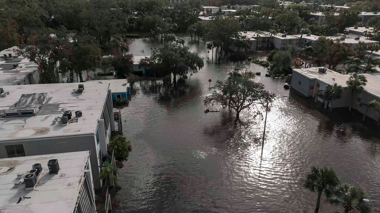 Flood waters sit in an apartment complex where people are being rescued in the aftermath of Hurricane Milton, Thursday, Oct. 10, 2024, in Clearwater, Fla. (AP Photo/Mike Stewart)