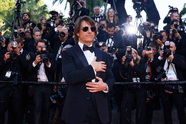 Tom Cruise poses for photographers upon arrival at the premiere of the film 'Mission: Impossible - The Final Reckoning' at the 78th international film festival, Cannes, southern France, Wednesday, May 14, 2025. (Photo by Joel C Ryan/Invision/AP)