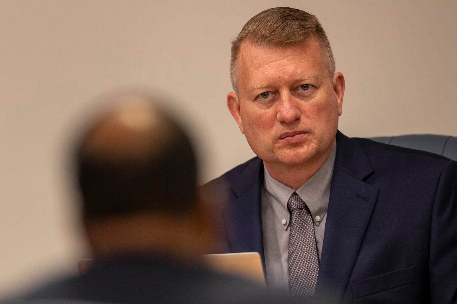 Jason Neubauer, board chairman for the Coast Guard's Titan Submersible Marine Board of Investigation, listens to testimony during a formal hearing inside the Charleston County Council Chambers, Monday, Sept. 23, 2024, in North Charleston, S.C. (Laura Bilson/The Post And Courier via AP, Pool)