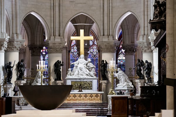 The altar designed by French artist and designer Guillaume Bardet is seen in the heart of Notre-Dame de Paris cathedral while French President Emmanuel Macron visits the restored interiors of the monument, Friday Nov. 29, 2024, in Paris. (Stephane de Sakutin, Pool via AP)