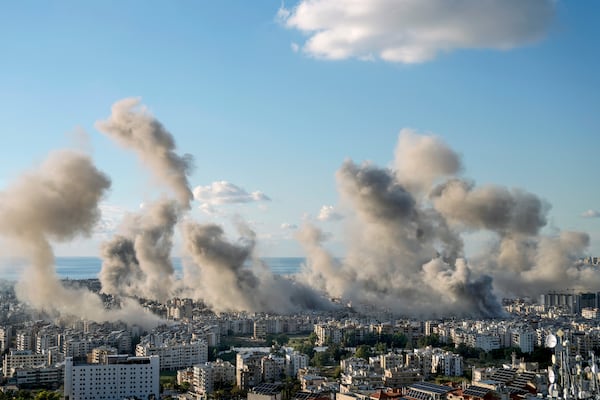 Smoke rises following an Israeli airstrike on Dahiyeh, in Beirut, Lebanon, Tuesday, Nov. 26, 2024. (AP Photo/Bilal Hussein)