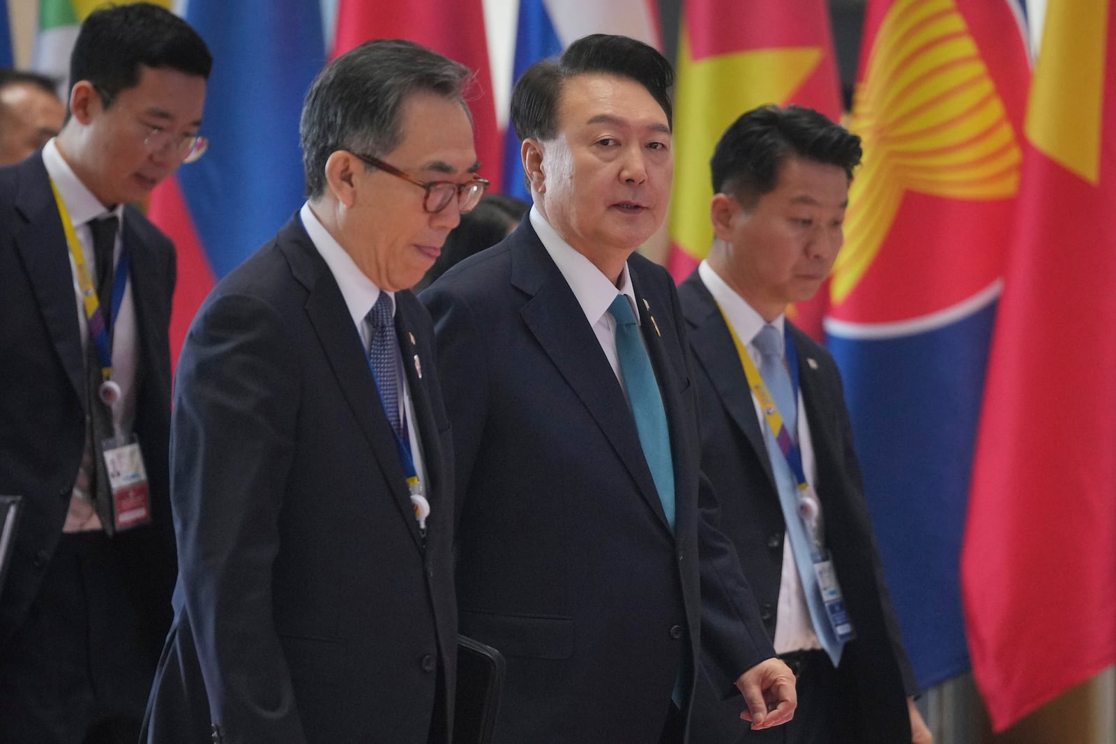 South Korean President Yoon Suk Yeol, center, arrives to attend the 25th Association of Southeast Asian Nations (ASEAN)-South Korea Summit in Vientiane, Laos, Thursday, Oct. 10, 2024. (AP Photo/Dita Alangkara)