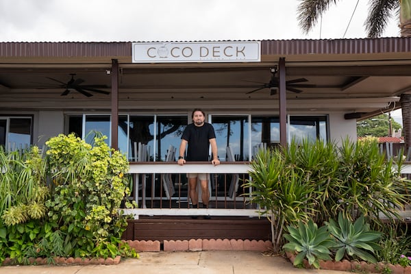 Javier Barberi, one of the owners of Mala Ocean Tavern, Coco Deck, and Pizza Paradiso, poses for a picture at Coco Deck, Monday, Nov. 18, 2024, in Lahaina, Hawaii. Barberi looks forward to the Maui Invitational, where Pizza Paradiso will be one of the food vendors. (AP Photo/Mengshin Lin)