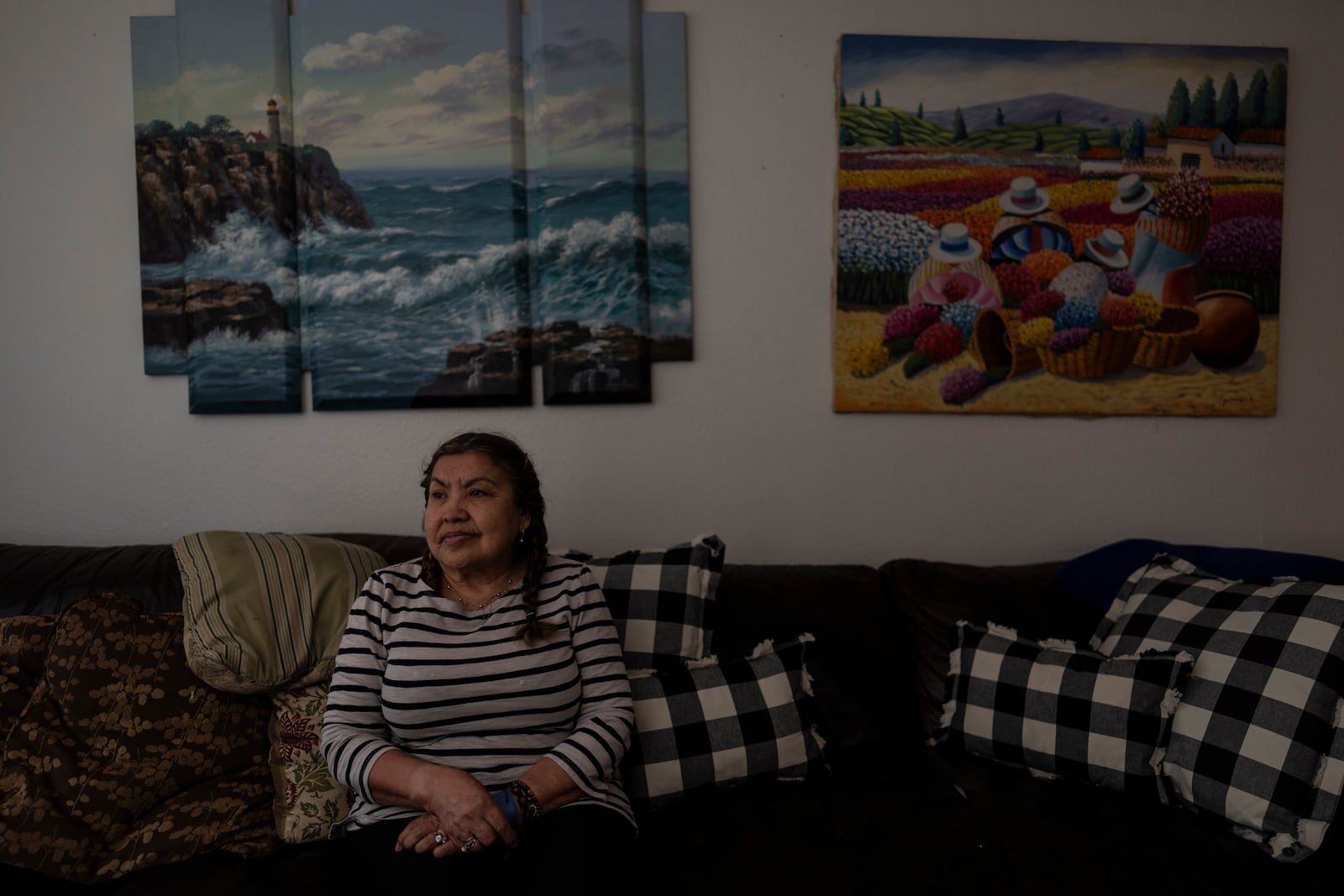 Marina Maalouf, a longtime resident of Hillside Villa, sits for a photo in her apartment in Los Angeles, Tuesday, Oct. 1, 2024. (AP Photo/Jae C. Hong)