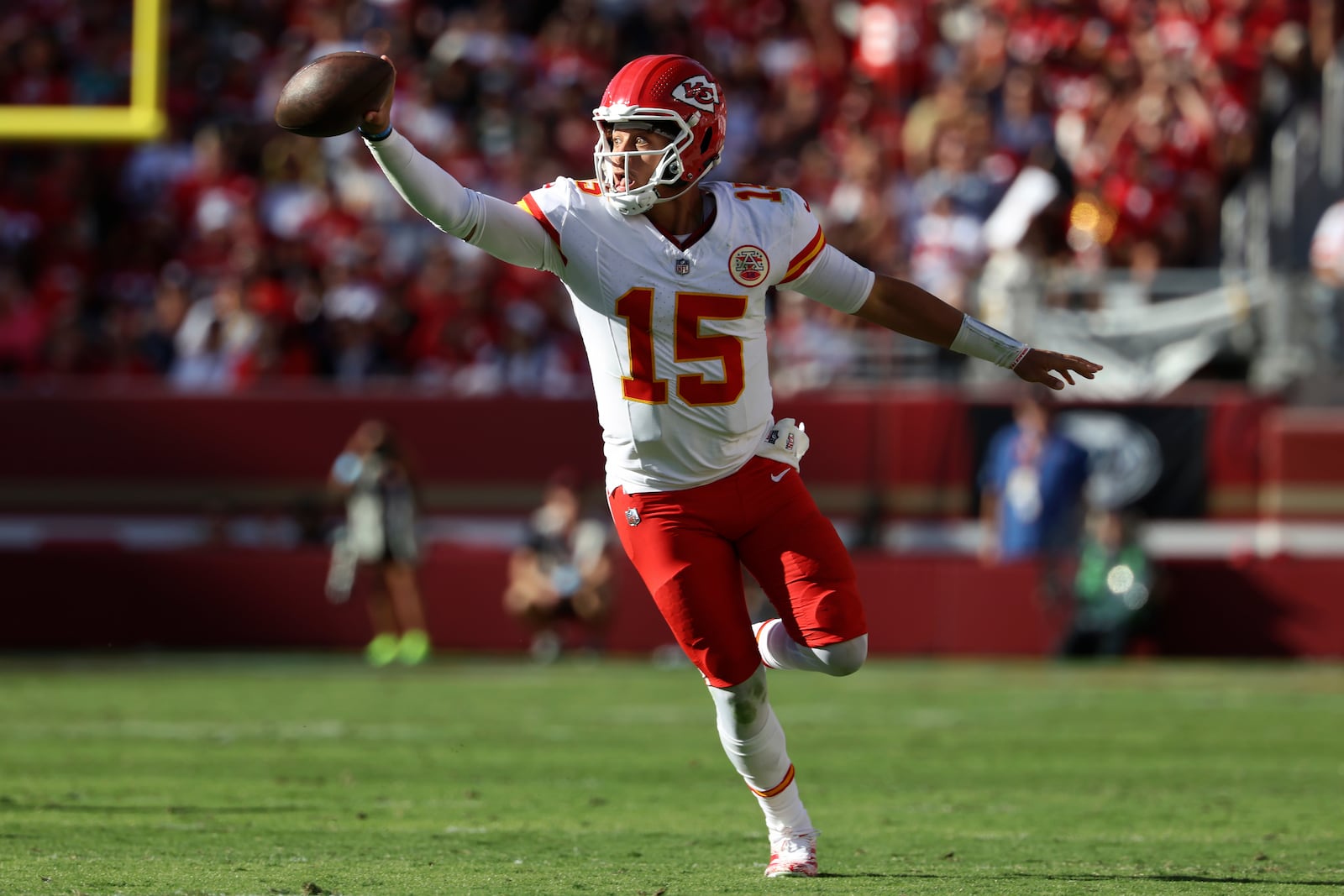 Kansas City Chiefs quarterback Patrick Mahomes (15) runs against the San Francisco 49ers during the second half of an NFL football game in Santa Clara, Calif., Sunday, Oct. 20, 2024. (AP Photo/Jed Jacobsohn)