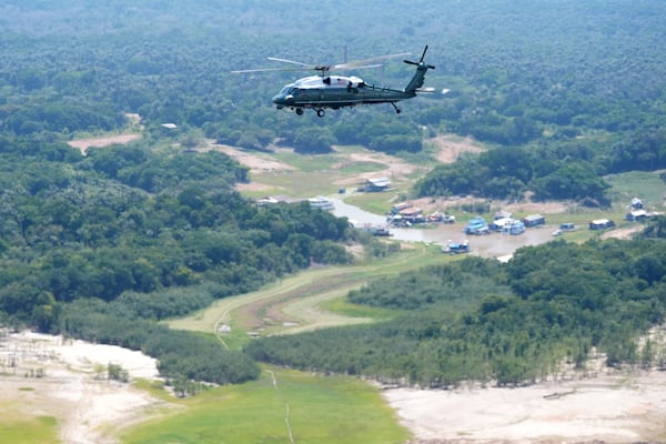 Marine One carrying President Joe Biden flies over the Amazon during a tour, Sunday, Nov. 17, 2024, in Manaus, Brazil. (AP Photo/Manuel Balce Ceneta)