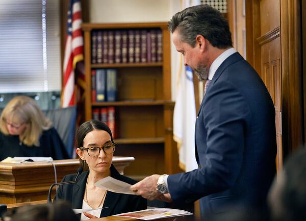 Defense attorney Alan Jackson questions Massachusetts State Police crime lab technician Christina Hanley about fragments of glass and plastic during the Karen Read second murder trail in Norfolk Superior Court, WEdnesday, May 21, 2025, in Dedham, Mass. (Greg Derr/The Patriot Ledger via AP, Pool)