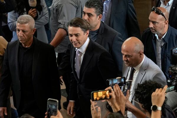 Amos Hochstein, center, a senior adviser to President Joe Biden, arrives ahead of a meeting with Lebanese Parliament speaker Nabih Berri, in Beirut, Lebanon, Wednesday, Nov. 20, 2024. (AP Photo/Bilal Hussein)