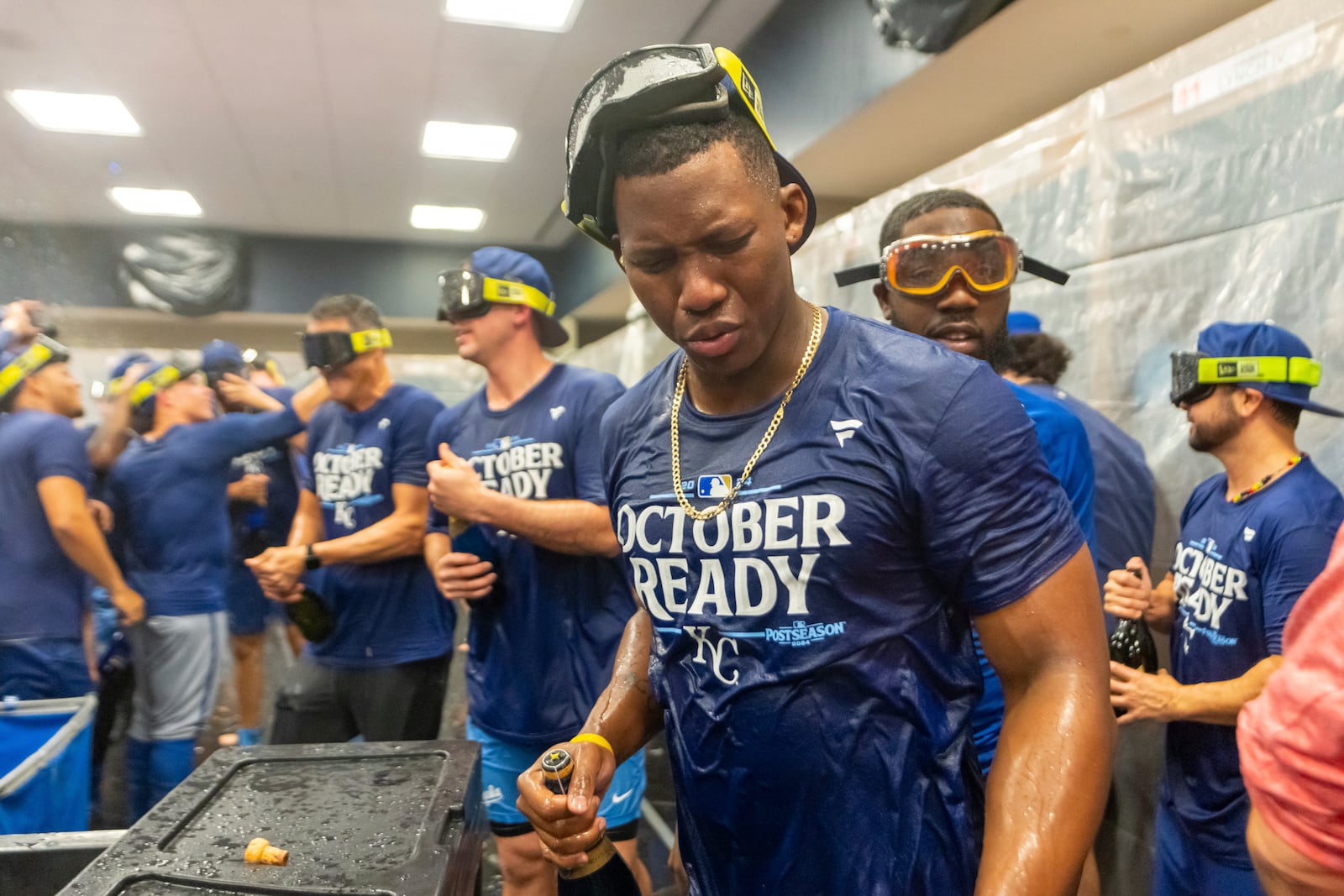 Kansas City Royals outfielder Dairon Blanco (44) celebrates in the locker room after a baseball game against the Atlanta Braves, Friday, Sept. 27, 2024, in Atlanta. (AP Photo/Jason Allen)