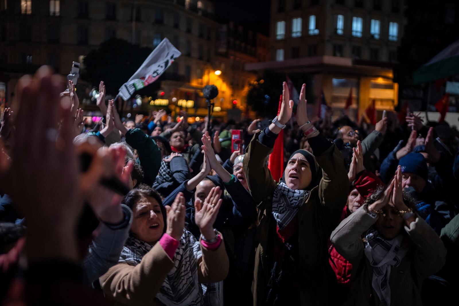 Protestors take part in a rally against the "Israel is Forever" gala organized by far-right Franco-Israeli figures, in Paris, Wednesday, Nov. 13, 2024, on the eve of the UEFA Nations League 2025 soccer match between France and Israel. (AP Photo/Louise Delmotte)