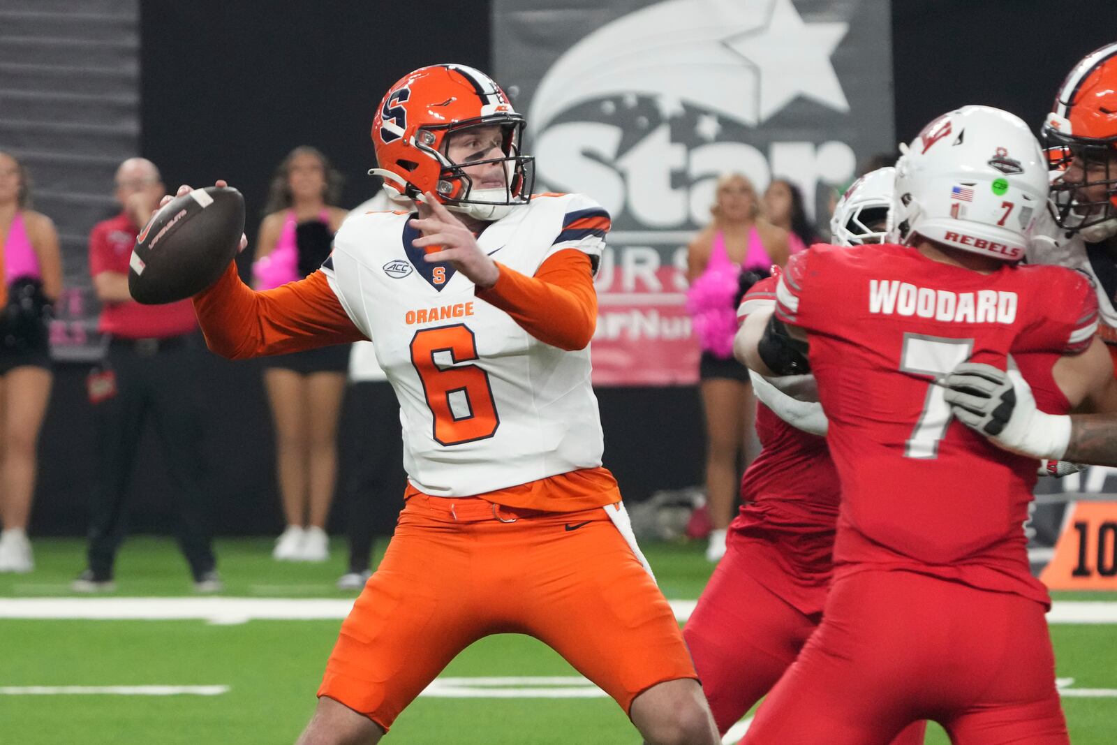 Syracuse quarterback Kyle McCord (6) looks to throw downfield against UNLV in the first half during an NCAA college football game, Friday, Oct. 4, 2024, in Las Vegas. (AP Photo/Rick Scuteri)