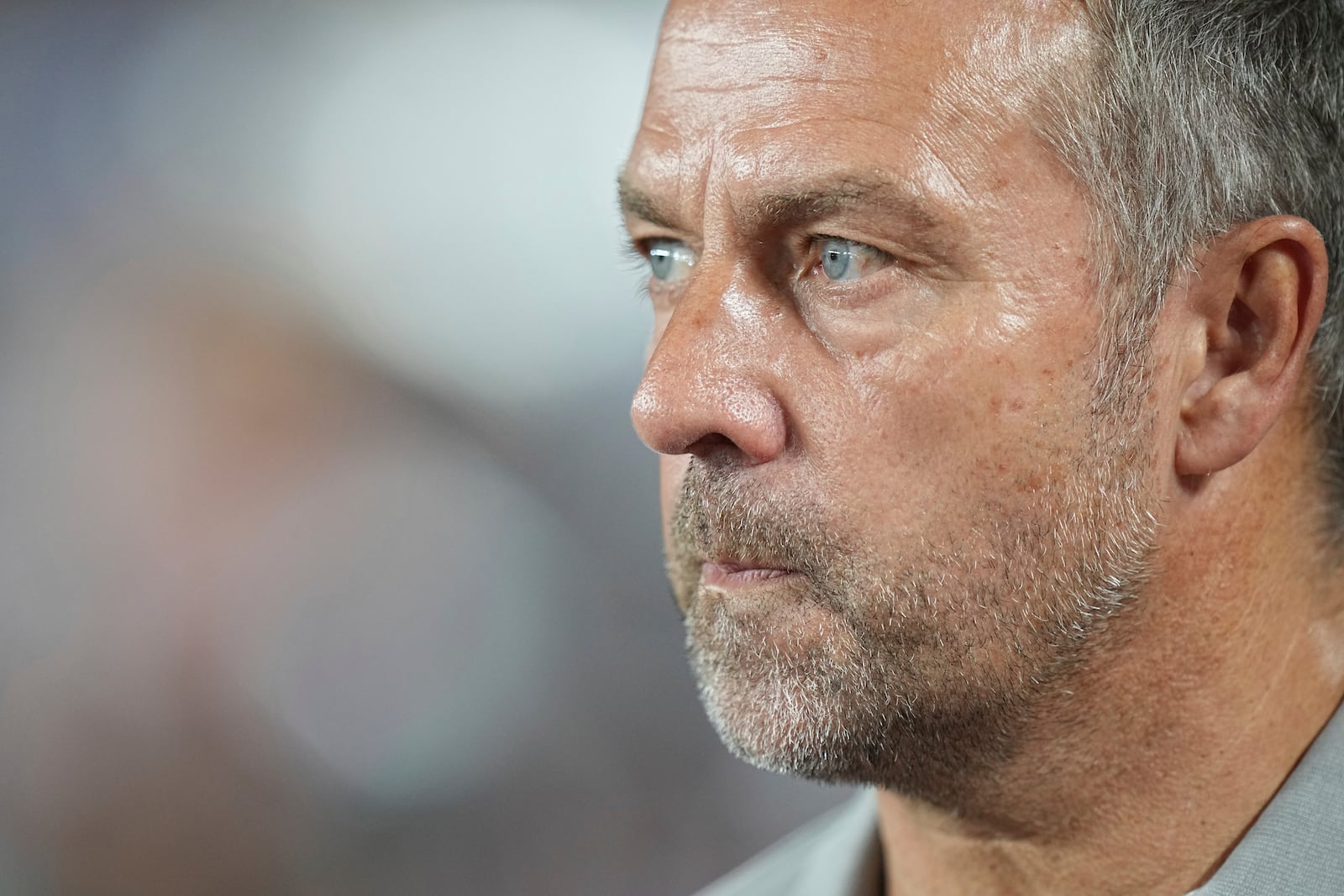 Barcelona's head coach Hansi Flick looks on prior to the start of the Champions League opening phase soccer match between Monaco and Barcelona at the Louis II stadium, in Monaco, Monaco, Thursday, Sept. 19, 2024. (AP Photo/Laurent Cipriani)