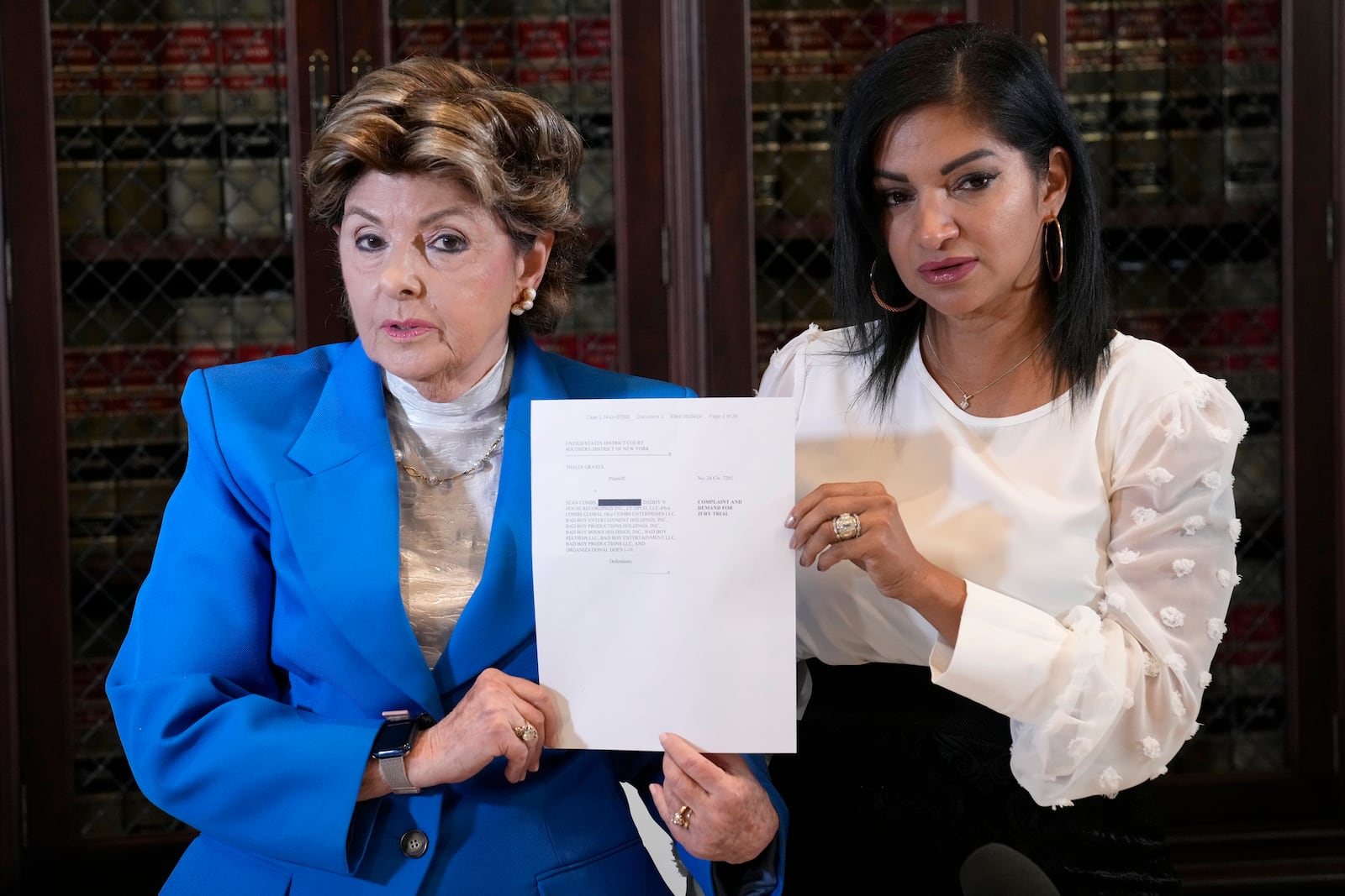 Attorney Gloria Allred, left, and Thalia Graves attend a press conference on Tuesday, Sept. 24, 2024, in Los Angeles. Graves is suing Sean "Diddy" Combs, accusing Combs of sexual assault in 2001. (AP Photo/Chris Pizzello)