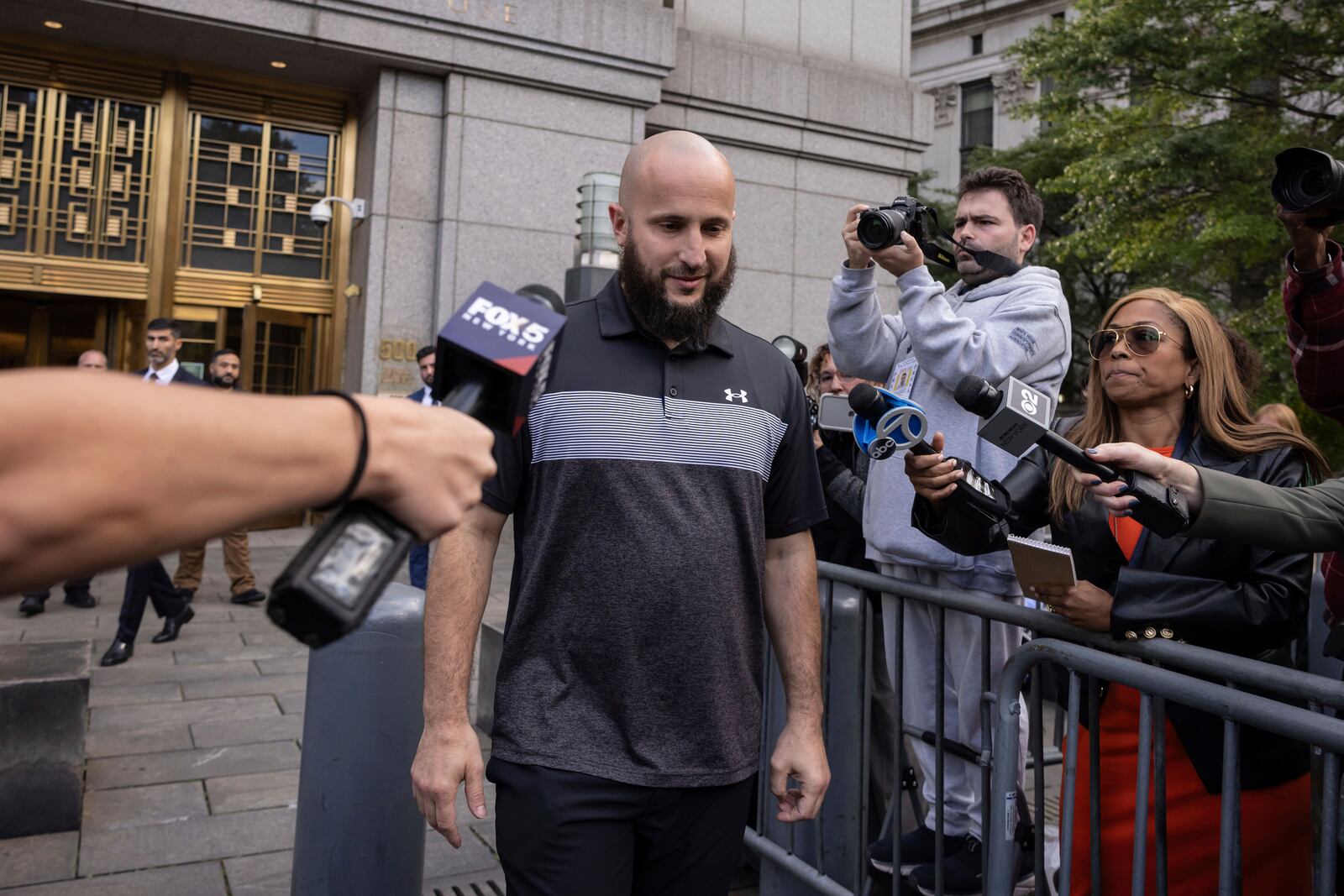 Mohamed Bahi, New York City Mayor's liaison to the Muslim community exits Manhattan Federal Court, Tuesday, Oct. 8, 2024, in New York. (AP Photo/Yuki Iwamura)