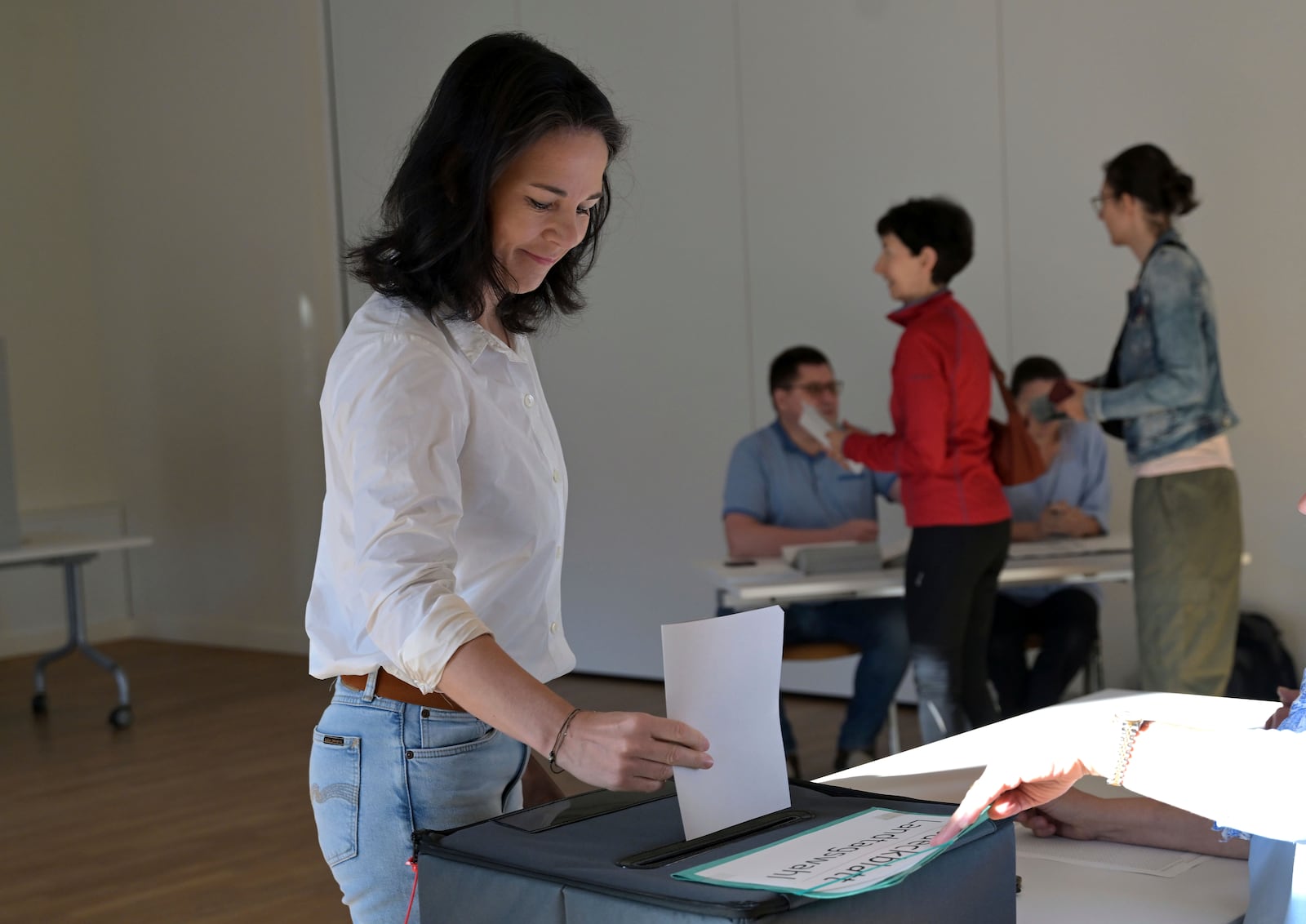 Germany's Foreign Minister Annalena Baerbock votes in the state election in Brandenburg at a polling station in Potsdam, Germany, Sunday Sept. 22, 2024. (Michael Bahlo/dpa via AP)