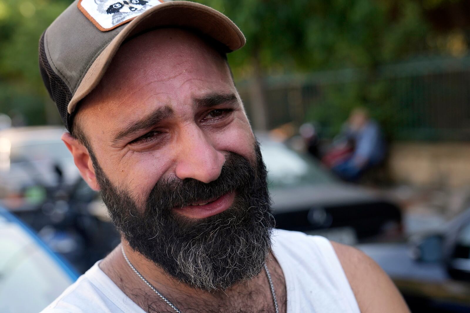 A man reacts after hearing the news of the death of Hezbollah leader Hassan Nasrallah in Beirut, Saturday, Sept. 28, 2024. (AP Photo/Hussein Malla)