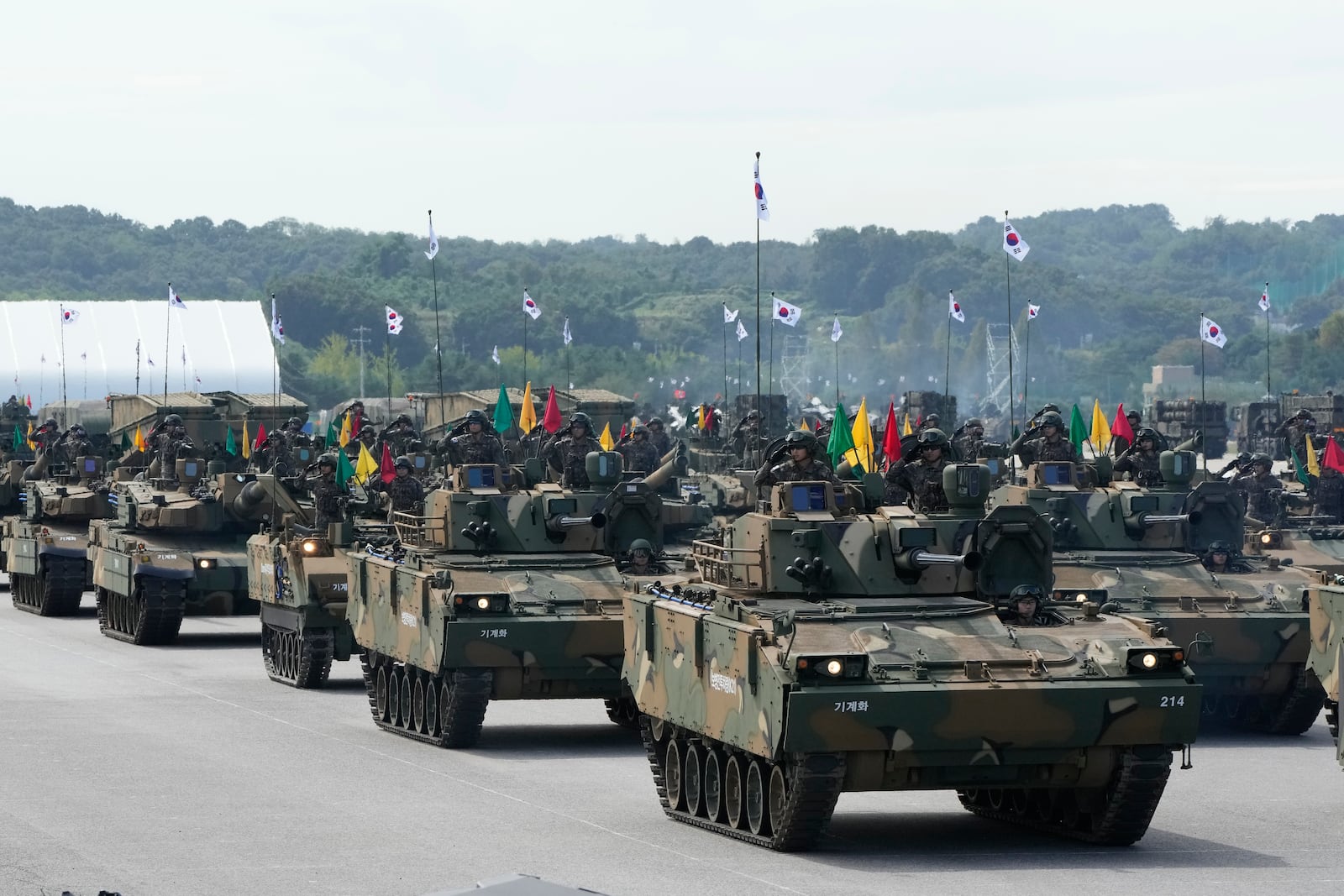 South Korean mechanized unit personnel parade with their armored vehicles during the media day for the 76th anniversary of Armed Forces Day at Seoul air base in Seongnam, South Korea, Wednesday, Sept. 25, 2024. (AP Photo/Ahn Young-joon)