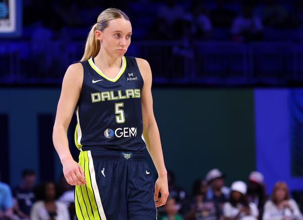 CORRECTS YEAR TO 2025 NOT 2020 - Dallas Wings guard Paige Bueckers (5) stands on the court during a Minnesota Lynx foul shot in a WNBA basketball game Friday, May 16, 2025, in Arlington, Texas. (AP Photo/Richard W. Rodriguez)