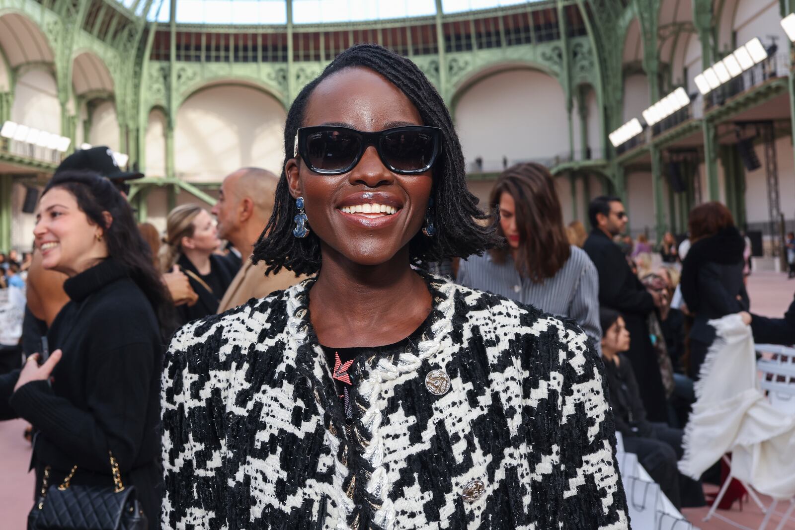 Lupita Nyong'o attends the Chanel Spring/Summer 2025 collection presented Tuesday, Oct. 1, 2024, in Paris. (Photo by Vianney Le Caer/Invision/AP)